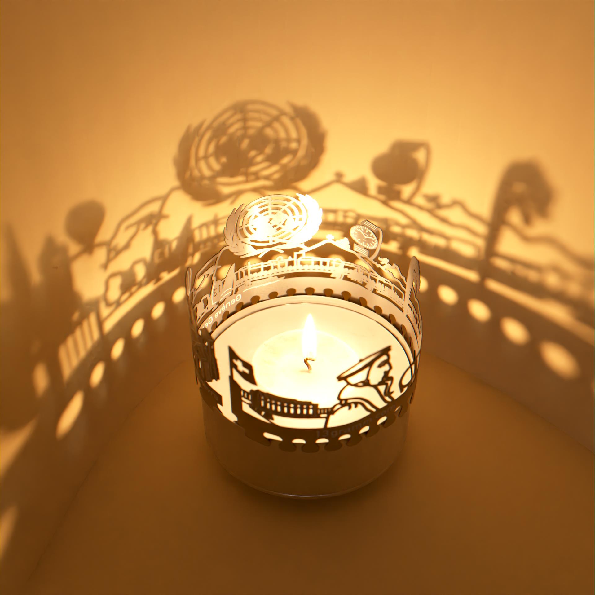 158_genf_geschenk_souvenir_kerze_schattenspiel_skyline_palais-des-nations_jet-deau_montres-de-luxe_luxusuhren_cathedrale-saint-pierre_stimmungslicht