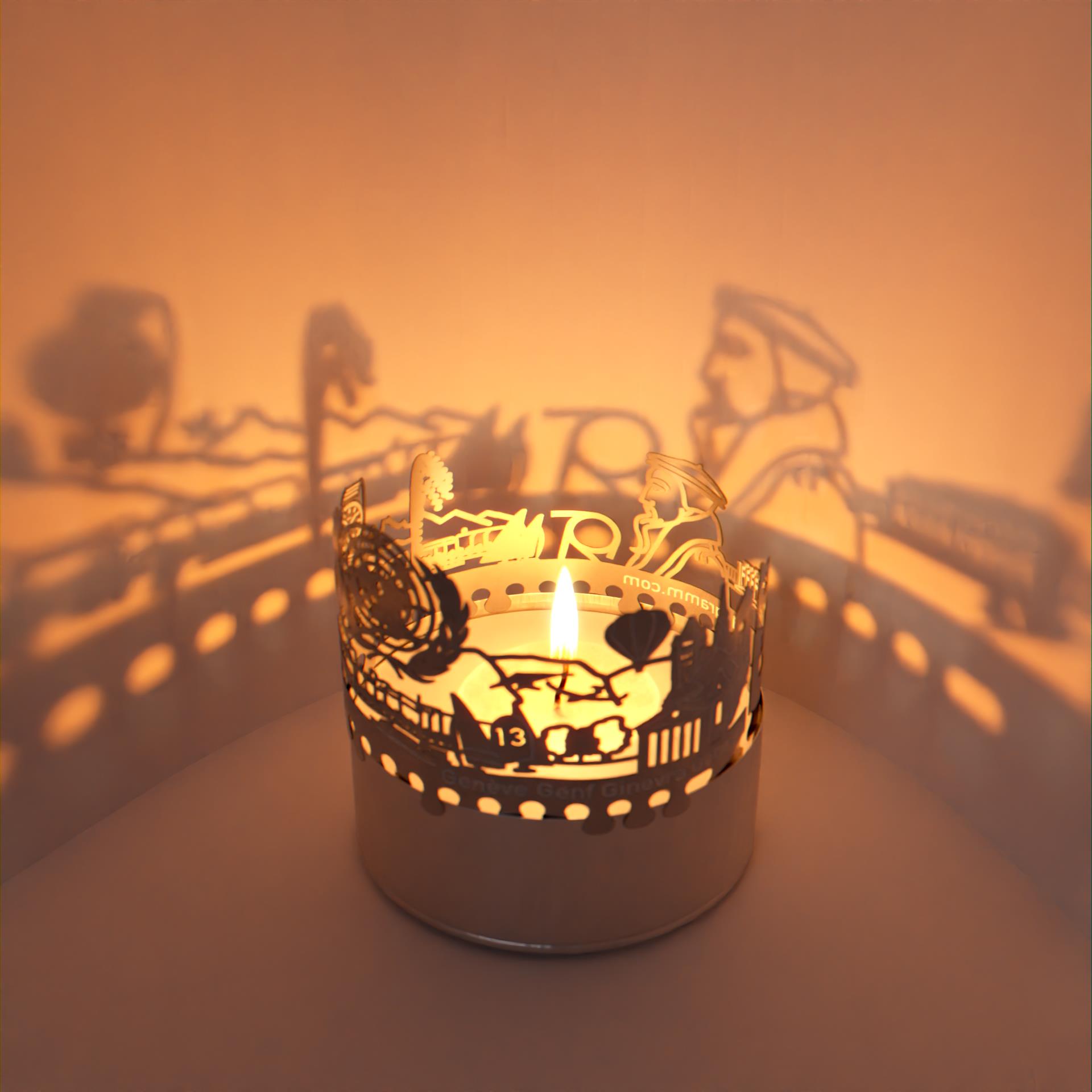 158_genf_kerze_schattenspiel_stadt_skyline_palais-des-nations_jet-deau_montres-de-luxe_luxusuhren_uno_postkarte_souvenir_stimmungslicht_atmosphaere