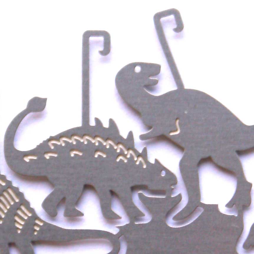 1980_dinosaurier-design_kerzen-windspiel_praehistorische-schatten_stegosaurus_velociraptor_pteranodon_geburtstagsgeschenk-fuer-kinder_raumdeko