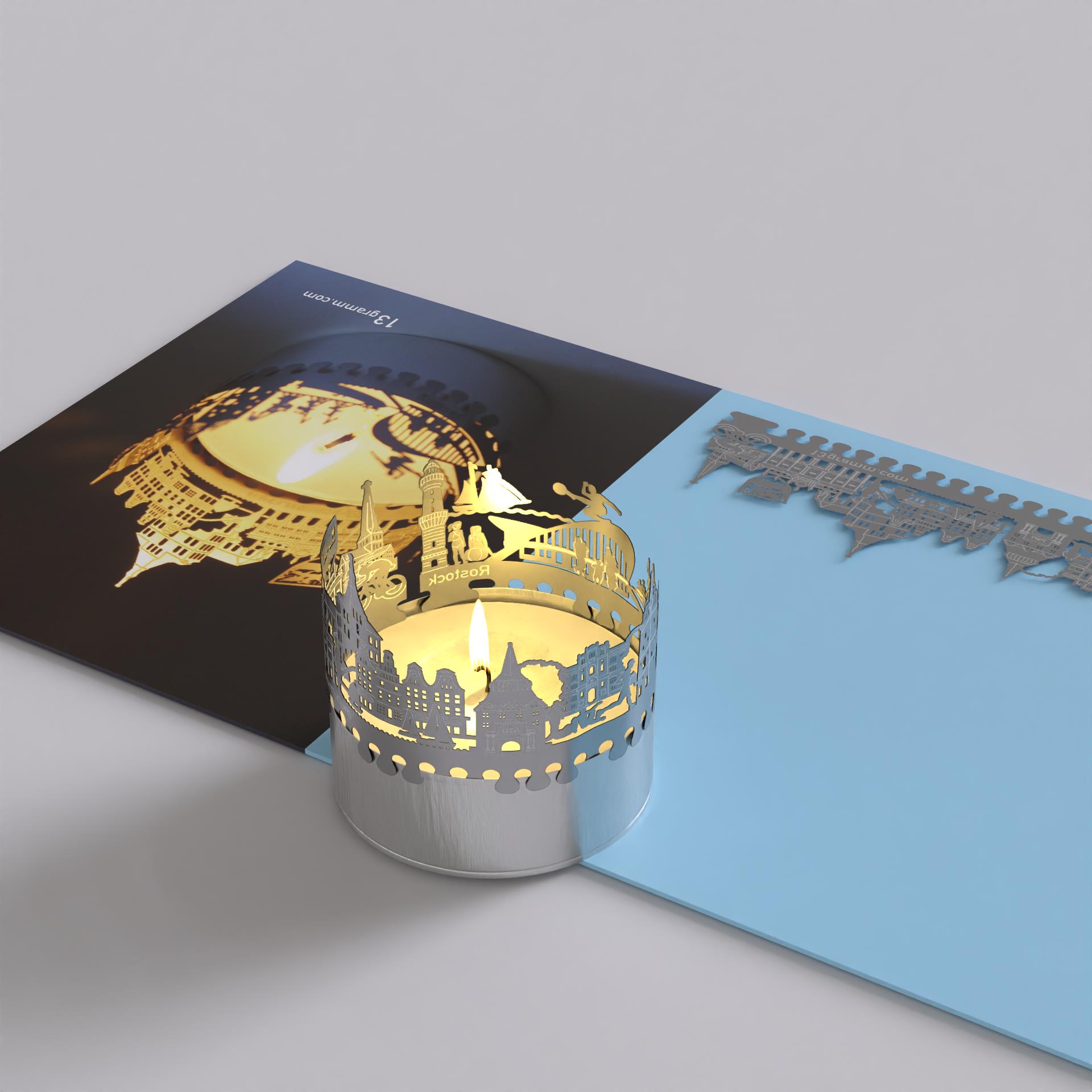 223_rostock_city-light_schattenspiel_geschenk_souvenir_kerze_radsport_katze_postkarte_marienkirche_rathaus_petrikirche_kroepeliner-tor_hafen