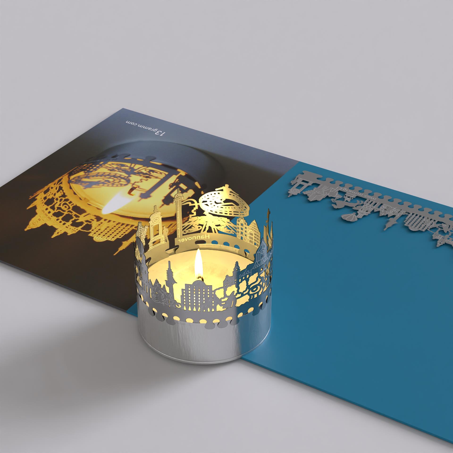 254_geschenk_motivkerze_hannover_skyline_windlicht_postkarte_atmosphaerisches-licht_city-light_nord-lb_anzeigerhochhaus-hannover_fackeltraeger